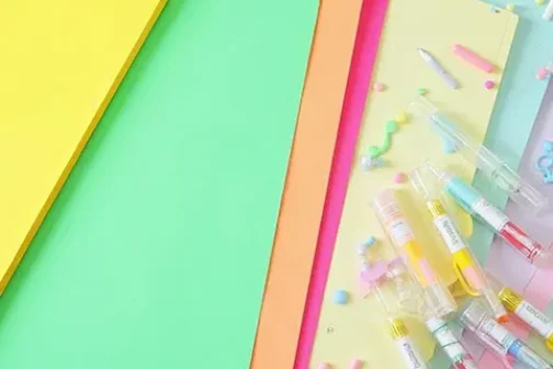 Colourful Paper with a mix of coloured pens